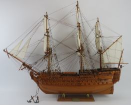 A fine hand crafted oak scale model of the HMS Victory, late 20th century. Built from scratch with