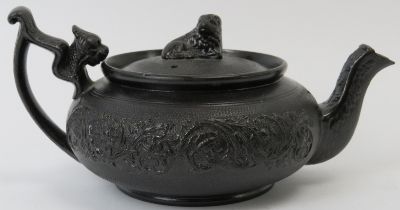 A rare English basalt ceramic teapot, 19th century. 18 cm length. Condition report: Very small chips