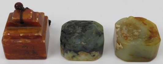 A group of three Chinese jade and hardstone carved seals, 20th century. Each bearing zhuanshu script