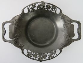 An English Art Nouveau pewter twin handled bowl, early 20th century. With foliate clover decoration.