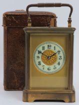 A French brass repeater carriage clock, late 19th century. Housed in a portable leather case. Clock: