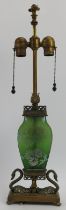 A European glass and mixed metal table lamp, late 19th century. Eclectic design with a Chinese