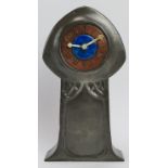 A Tudric for Liberty pewter cased and enamelled carriage clock. With an enamelled cabochon and