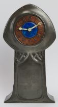 A Tudric for Liberty pewter cased and enamelled carriage clock. With an enamelled cabochon and