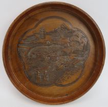 A Japanese carved wood tray with crossed Japanese Empire flags to the reverse, early 20th century.