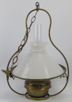 A brass hallway ceiling lamp with glass shade and funnel, late 19th/early 20th century. Framework: