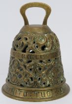 An ecclesiastical brass bell, 19th century. Cast in openwork with inscribed bands in Latin