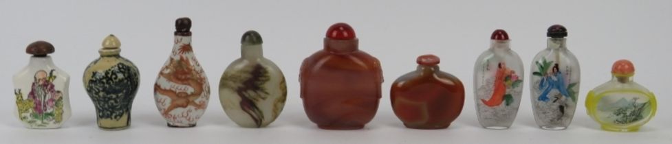 A group of Chinese porcelain, glass and carved agate snuff bottles, 20th century. (9 items) 8.3 cm