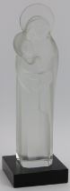 A Lalique frosted glass Madonna and Child. Supported on a black glass base and signed ‘Lalique