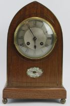 A Mappin and Webb mahogany and inlaid mother of pearl Gothic arch mantel clock, circa 1900. With a