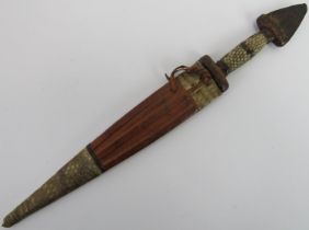 Tribal Art: An African dagger, probably Hausa people, Nigeria. The pommel formed from the tip of a