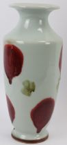 A Chinese sang de boeuf and celadon spotted white porcelain vase, 20th century. Cafe au lait