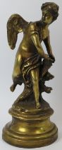 A brass statue of an angel beside a tree stump, probably late 19th/early 20th century. 34 cm height.