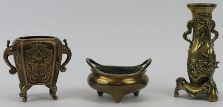Three Chinese bronze and brass wares, 19th/20th century. Comprising a twin handled tripod censer