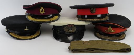 Militaria: A group of vintage British military Army and Navy peaked caps and a side hat. (6