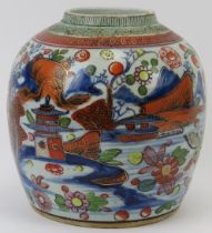 A Chinese export clobbered ginger jar, early 19th century. Underglaze blue with gilt highlighted