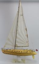 A Ritual scale model a ‘Cup Yacht 650’. Mounted on a detachable stand. 109 cm height, 65 cm width.