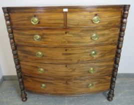 A Regency Period mahogany chest, housing two short over four long graduated cock-beaded drawers with