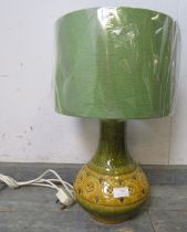 A vintage mid-century Italian ceramic table lamp of baluster form, having incised decoration,