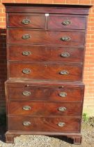 A George III flame mahogany chest on chest, the upper section with two short over three long