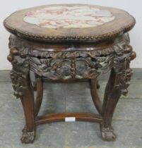 An antique Chinese rosewood occasional table/plant stand, the top with inset rogue marble and beaded