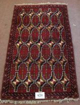 Mid-late 20th century Persian rug central repeat motif block pattern on a deep red ground. 150cm x