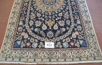 A central Persian part silk Nain rug, blue on cream ground central motif surrounded on foliage.