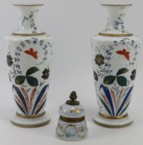 A pair of Victorian opaque white glass vases and an opalescent glass Beney table top lighter. Both