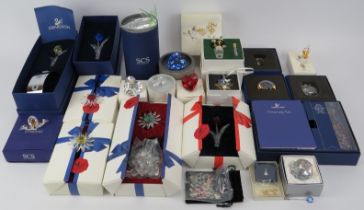A collection of Swarovski crystal glass ornamental items. (Quantity). Condition report: Good