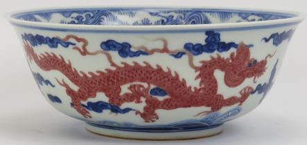 A Chinese underglazed blue and iron red dragon bowl, 20th century. Six character Hongzhi Ming
