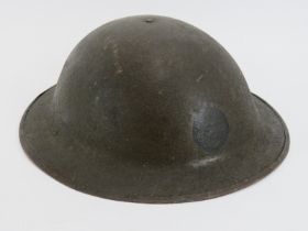 Militaria: A World War I American Brodie helmet. 31.1 cm length. Condition report: Some age related