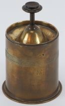 A rare World War I Trench Art artillery shell spring loaded ash tray. 15.8 cm height, 10.3 cm