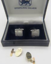 A pair of silver square design cuff links, Birmingham 2003, boxed and a pair of 9ct gold oval