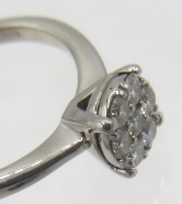 A 9ct white gold diamond cluster ring, size K. Round brilliant cut diamonds approx 0.3cts, approx - Image 4 of 6