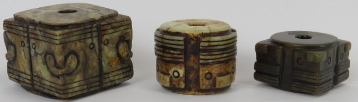 Three Chinese jade and hardstone carved congs, 20th century. Largest cong: 5.2 width, 4.2 height. (3