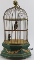 A large singing bird cage automaton, 19th century. Modelled with two birds enclosed within a brass