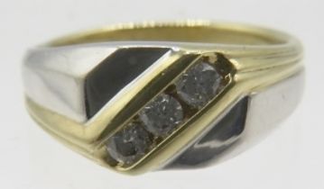 A 9ct yellow & white gold ring, diagonally set with three round brilliant cut diamonds, size P,