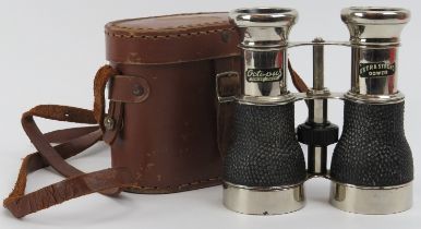 A vintage pair of Octopus Series ‘Extra Strong Power’ binoculars. With simulated shagreen grips