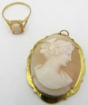 A 9ct yellow gold cameo ring, size N and a yellow metal cameo pendant. Approx weight 9.4 grams, (