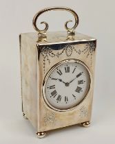 A fine silver cased Harrods French carriage clock with leather carry case. The silver case is