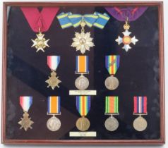 Militaria: A World War I and World War II joint family group of medals and order badges.
