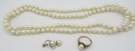 A strand of individually knotted pearls, approx 34" long, a pair of 9ct gold screw back pearl