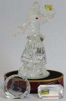 A Swarovski ‘Masquerade Columbine’ crystal glass figurine, 2000 SCS edition. Glass plaques,