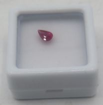 A pear shaped ruby (approx 0.47cts), boxed. Condition report: Good condition.