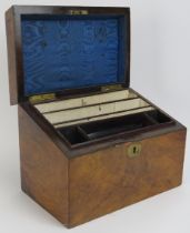 A mahogany stationery box, late 19th/early 20th century. With a hinged cover and interior fitted