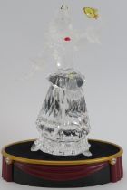 A Swarovski ‘Masquerade Columbine’ crystal glass figurine, 2000 SCS edition. Stand, boxes and