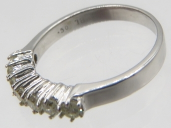 An 18ct white gold seven stone diamond ring, round brilliant cut diamonds, approx 0.50cts, size O. - Image 4 of 6