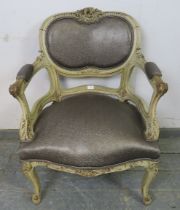 A 19th century French open-sided armchair, the well-carved painted frame having profuse acanthus