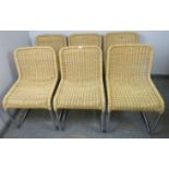 A set of six mid-century Italian dining chairs, the cantilever tubular chrome frames with woven