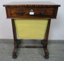A fine Regency Period coromandel worktable, having one long drawer with turned ebony handles and